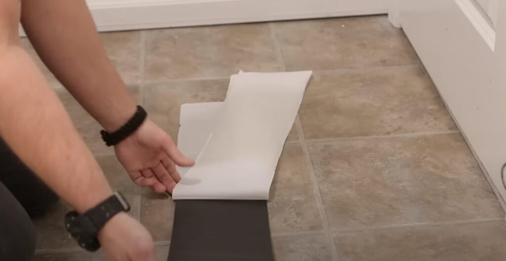 peeling a sticky vinyl